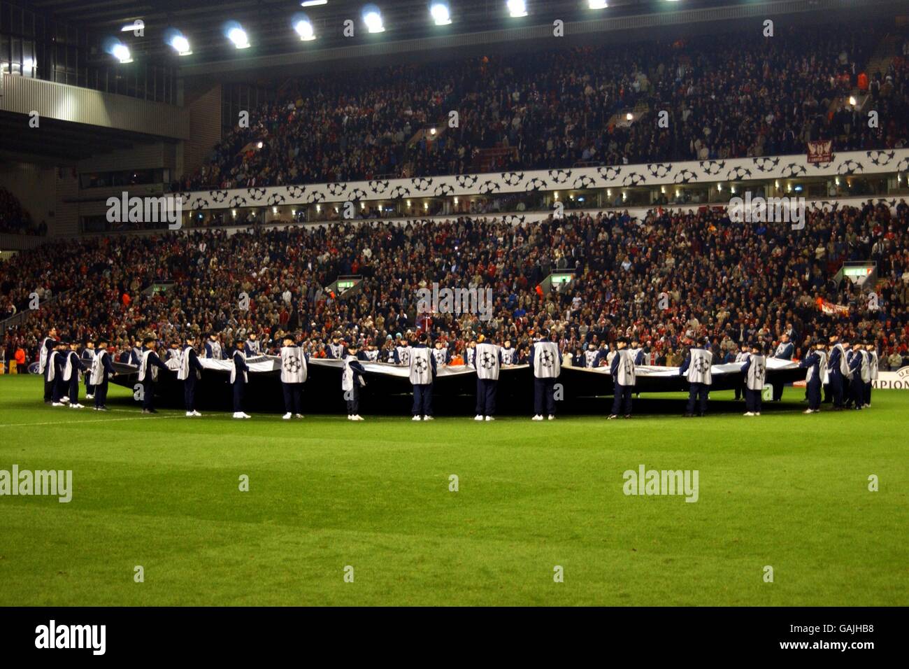 The ballboys gather around the giant UEFA Champions League starball logo Stock Photo Alamy