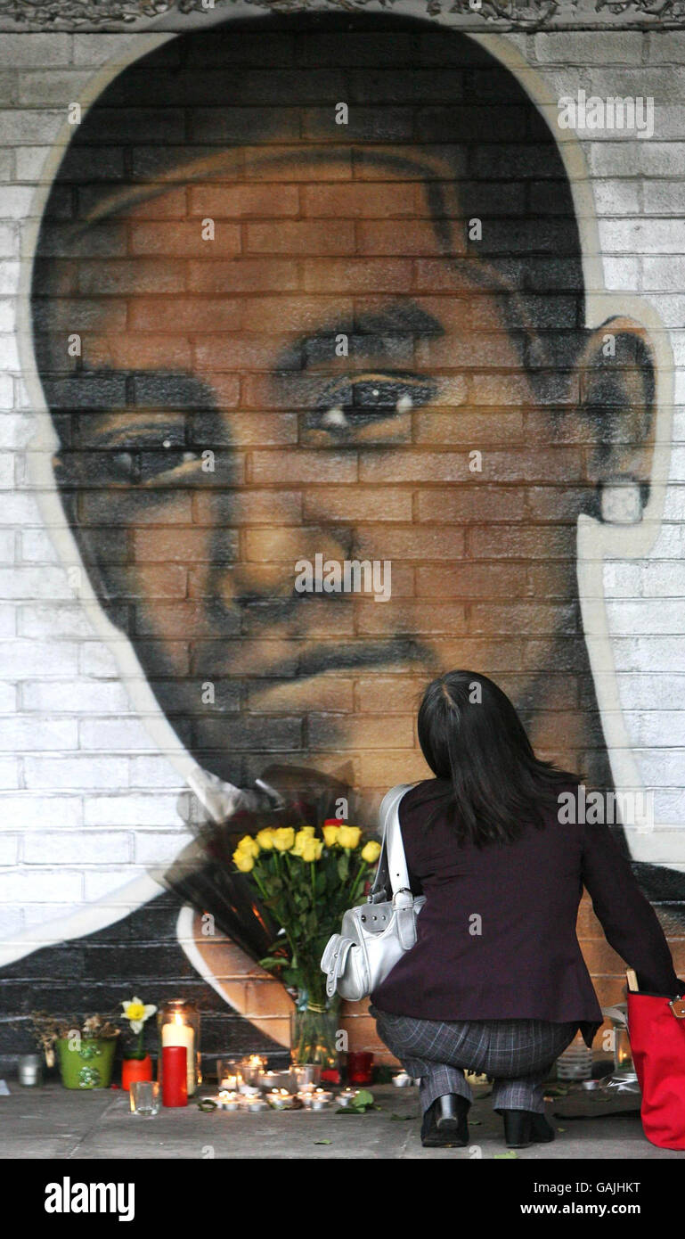 Tim, the mother of murdered teenager Billy Cox, looks at the mural ...