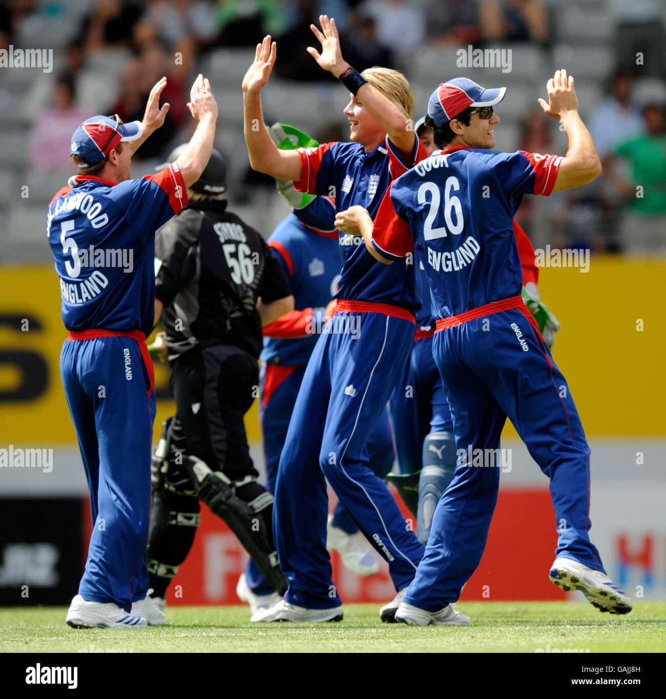 England's Stuart Broad (centre) celebrates the wicket of New Zealand's Scott Styris during the third ODI at Eden Park, Auckland New Zealand. Stock Photo