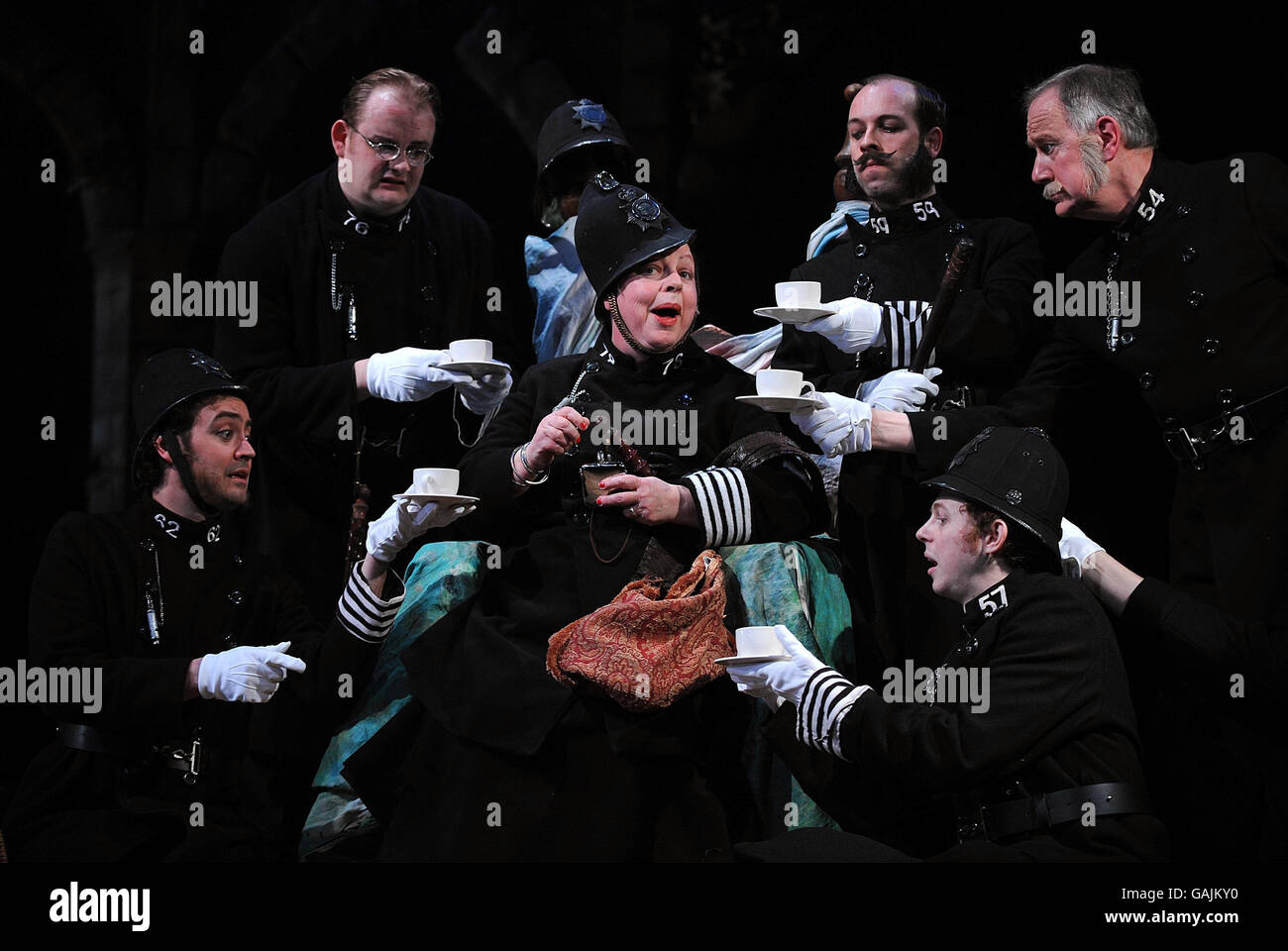 Jo Brand (centre), who plays Sergeant of Police, perfoms a scene from The Pirates of Penzance