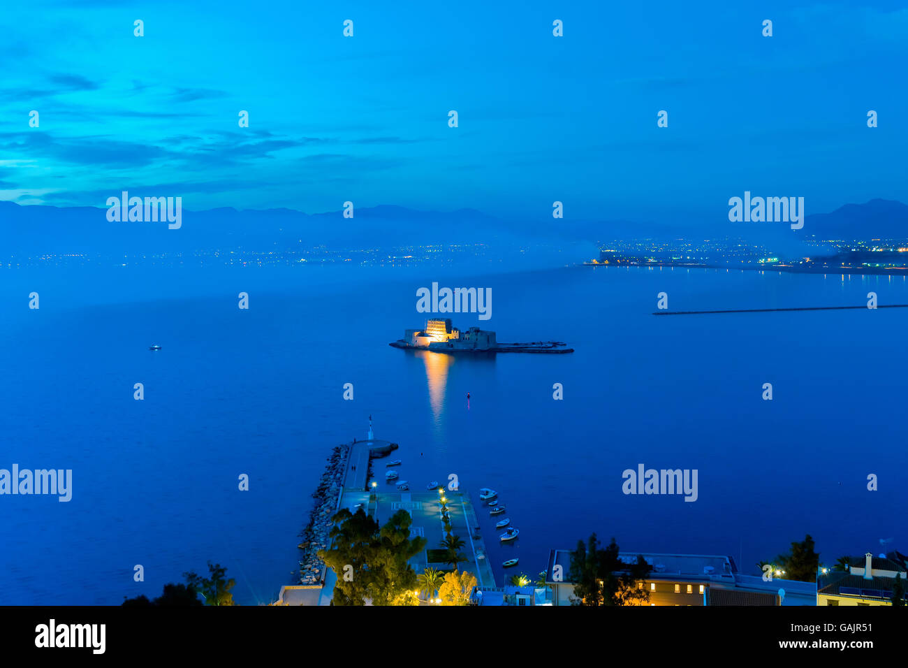 Blue hour of Bourtzi castle at Nafplio in Greece. Stock Photo
