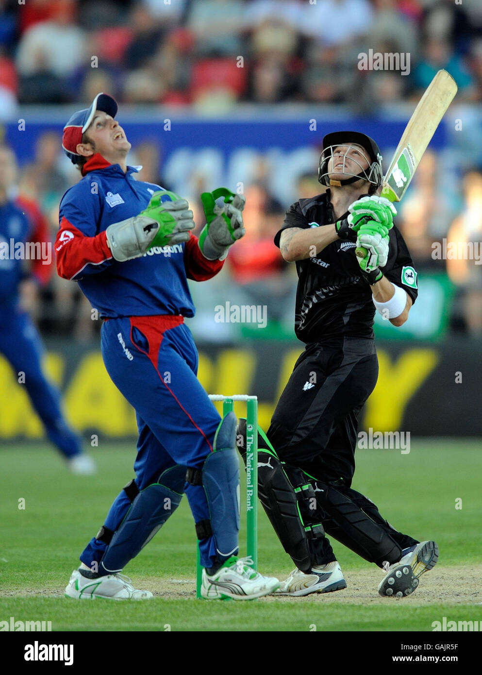 England wicketkeeper Phil Mustard and Brendon McCullum watch as Stuart Broad (unseen) misses a catch during the fifth One Day International match at the AMI Stadium, Christchurch, New Zealand. Stock Photo