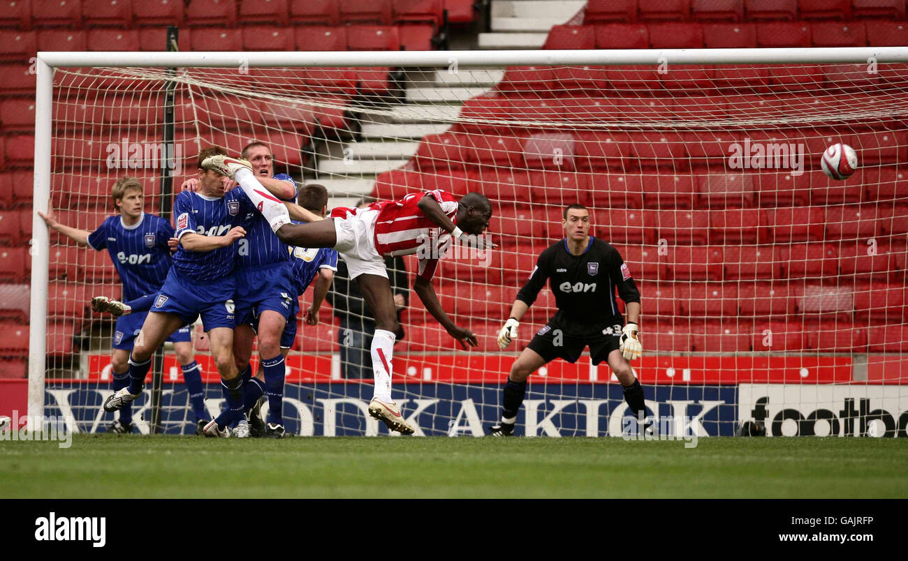 Stoke's Mamady Sidibe attempts a head on goal during the Coca-Cola Championship match at the Britannia Stadium, Stoke. Stock Photo