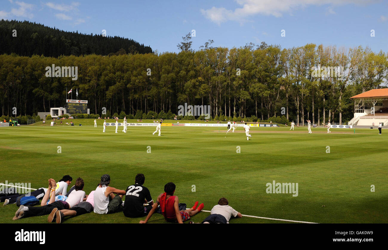 University students watch England's field during the match at the University Oval, Otago University, New Zealand. Stock Photo