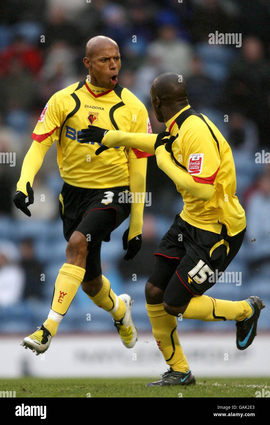 Watford's Jordan Stewart celebrates scoring his second goal against Burnley with team mate Steven Kabba during the Coca-Cola Championship match at Turf Moor, Burnley. Stock Photo