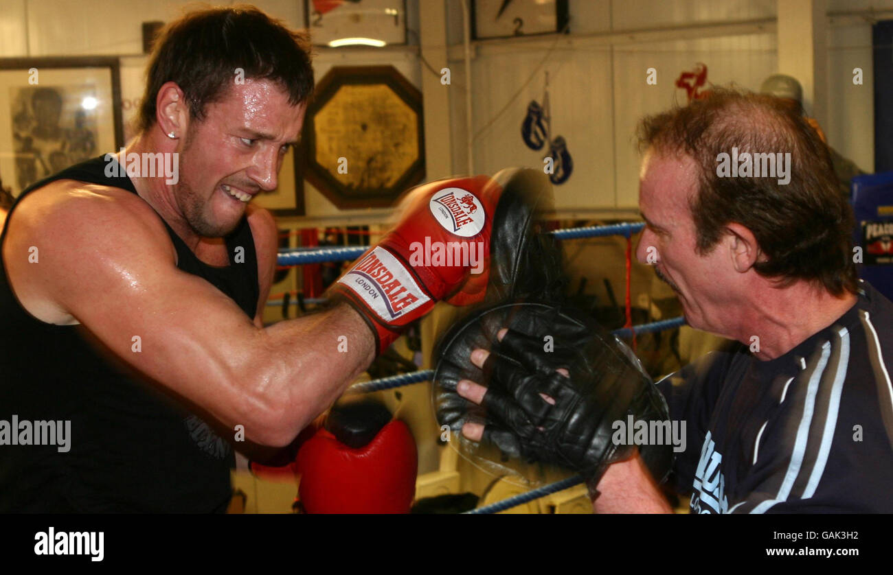 Enzo Maccarinelli on the pads with his trainer Enzo Calzaghe at the Peacock Gym in London. Stock Photo