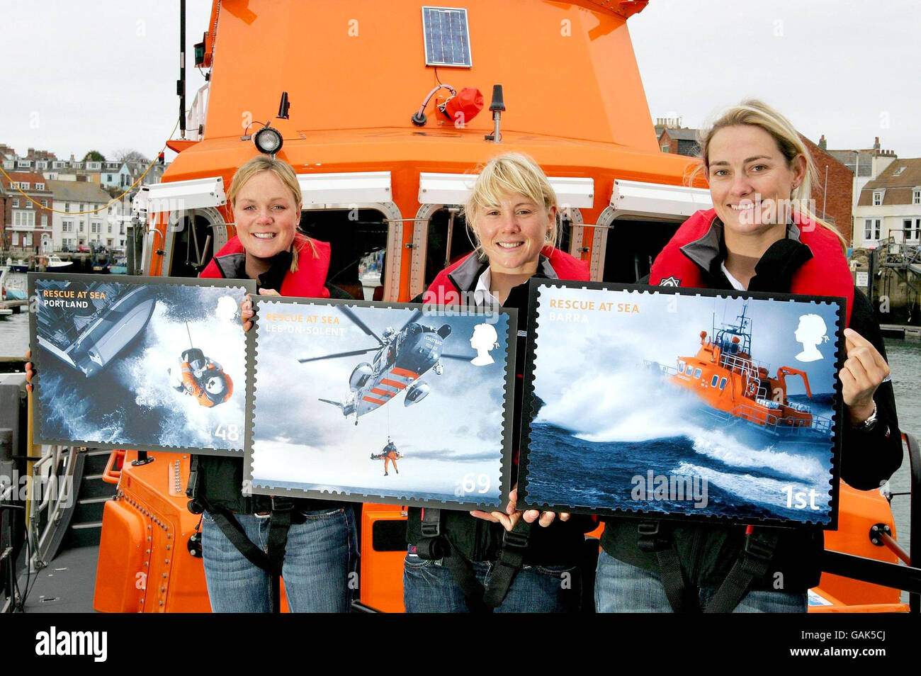 Photo dated 06/03/08 of GB Olympic Sailing Team members (Left to right) Pippa Wilson, Sarah Ayton and Sarah Webb aboard RNIB all-weather lifeboat Ernest & Mable 17-32, at Weymouth Lifeboat Station, Dorset. Stock Photo