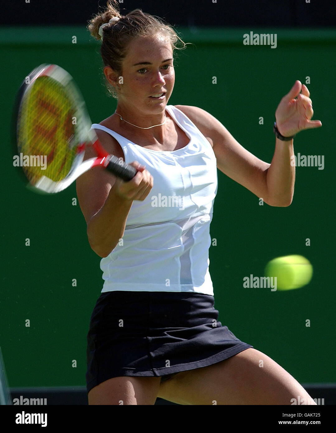 Klara Koukalova (CZE) returns the ball back to Monica Seles (USA). Stock Photo