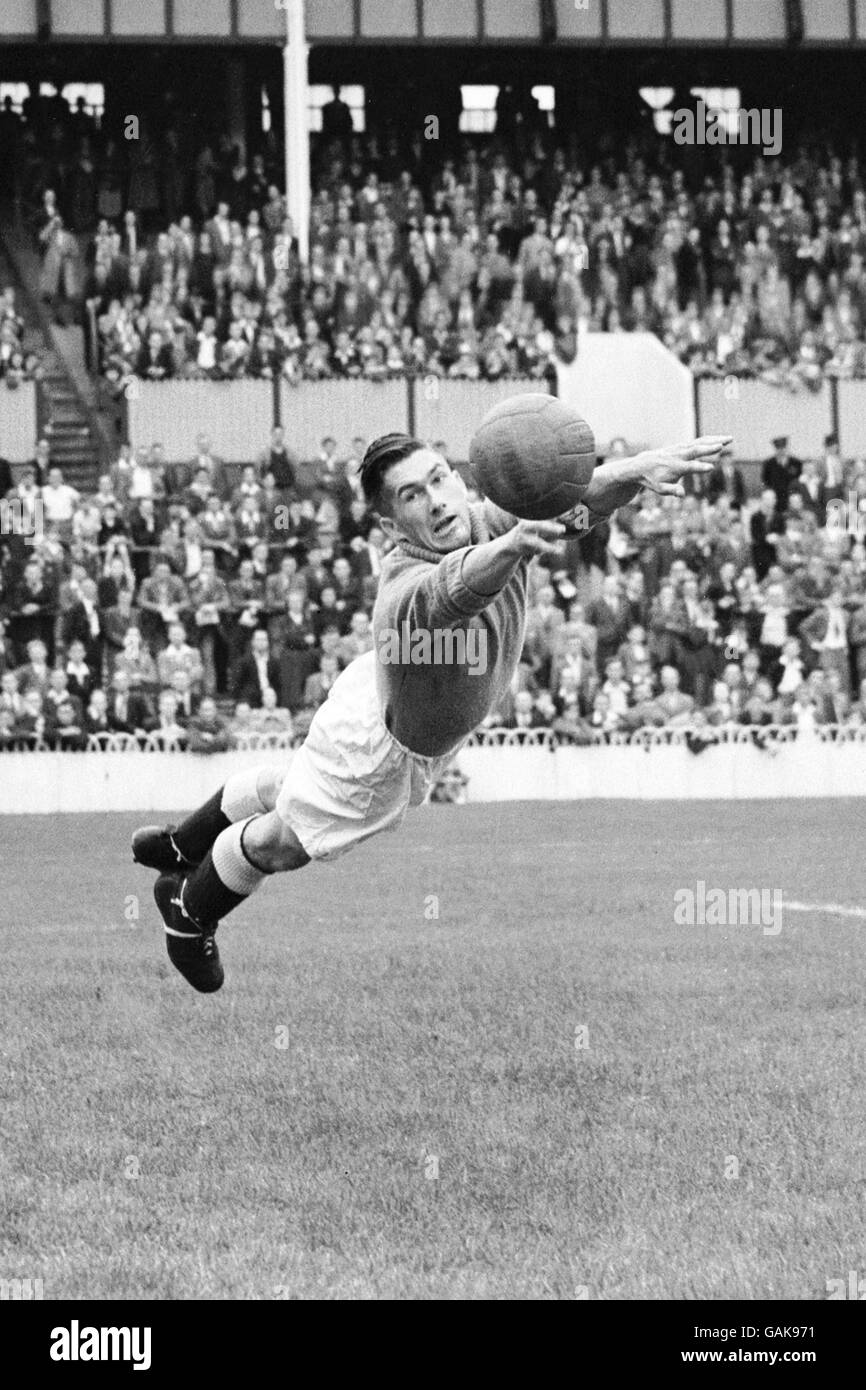 Soccer - Tottenham Hotspur Public Trial Match - Reds v Whites. Reds goalkeeper Ron Reynolds makes a full length fingertip save Stock Photo