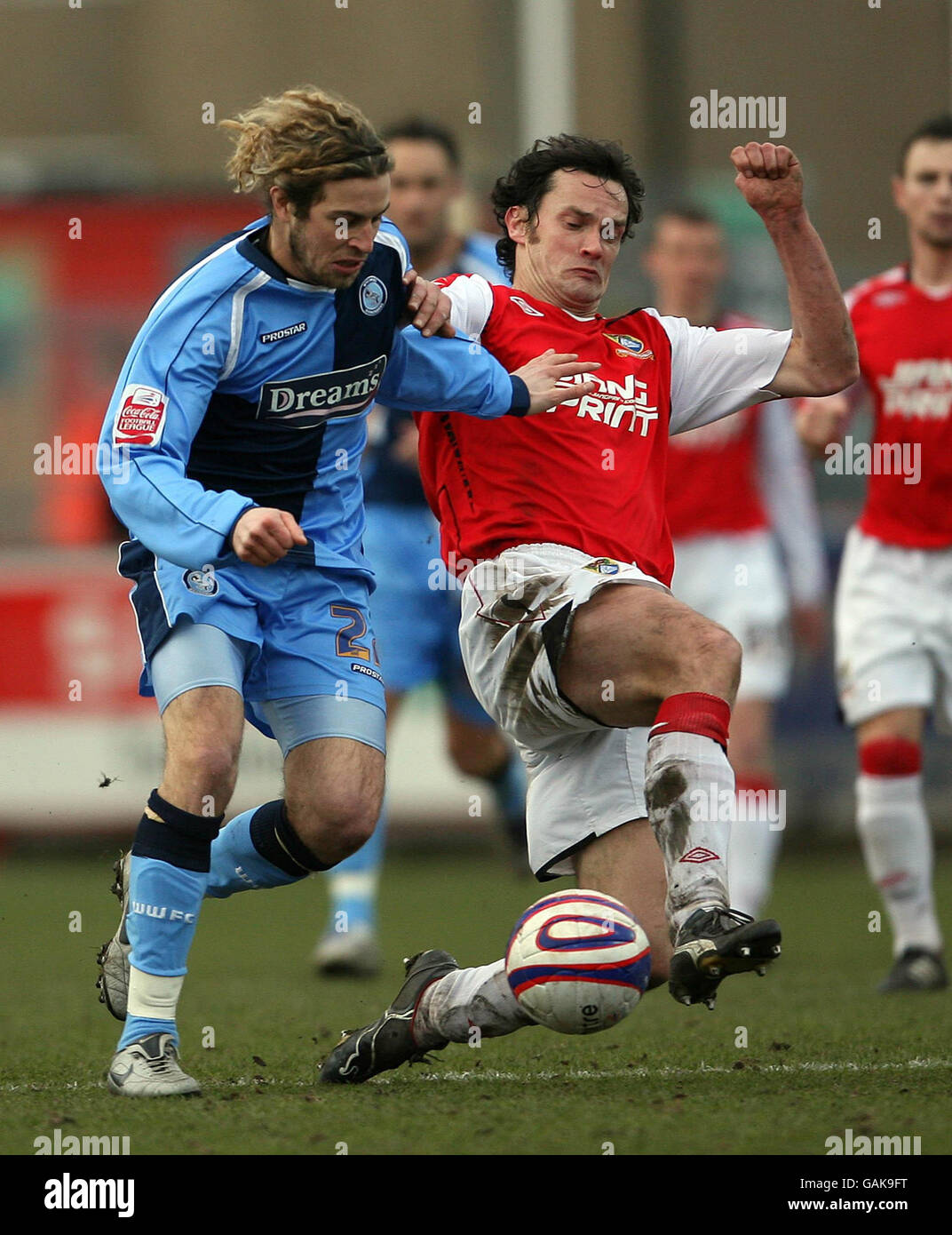 Soccer - Coca-Cola Football League Two - Morecambe v Wycombe Wanderers - Christie Park. Wycombe Wanderers Sergio Torres and Morecambe's Stuart Drummond during the Coca-Cola League Two match at Christie Park, Morecambe. Stock Photo