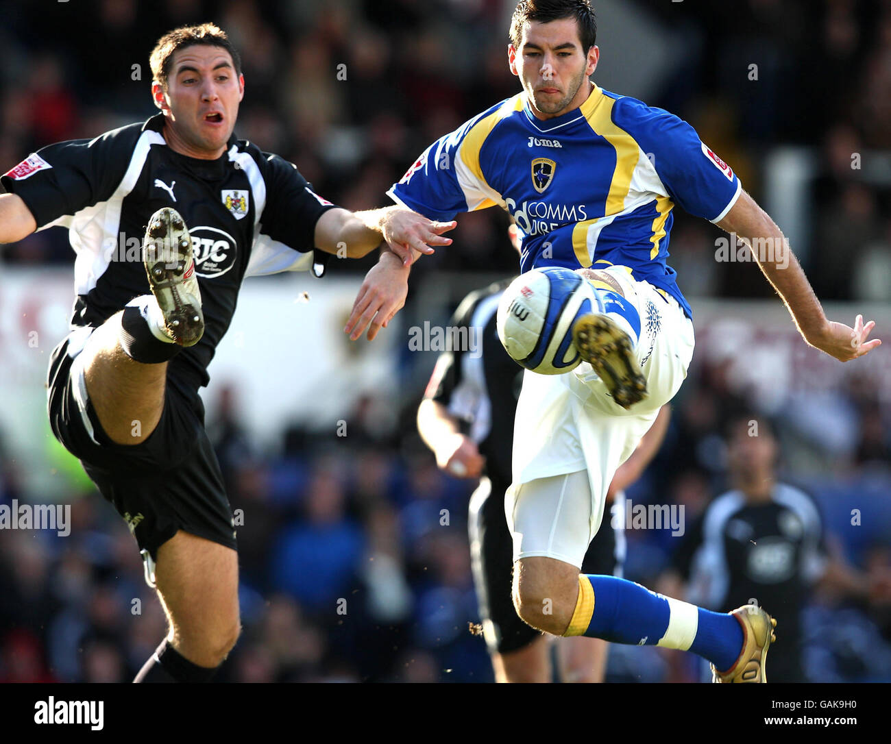 Cardiff City's Joe Ledley competes with Bristol's Bradley Orr during the Coca-Cola Championship match at Ninian Park, Cardiff. Stock Photo