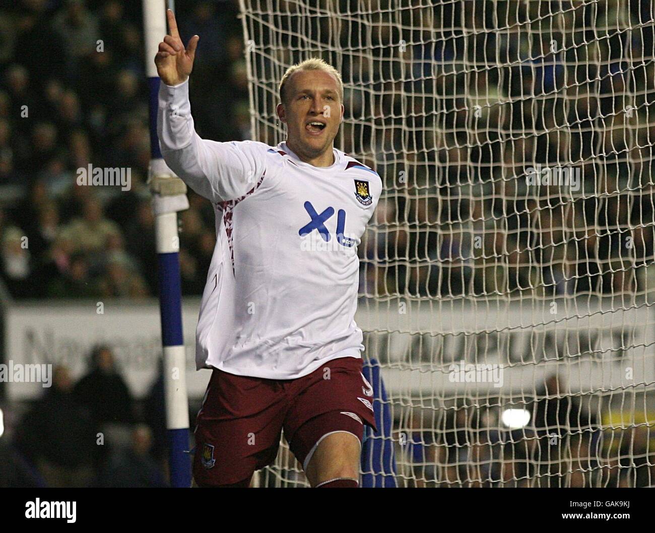 West Ham United's Dean Ashton celebrates scoring the equalising goal ...