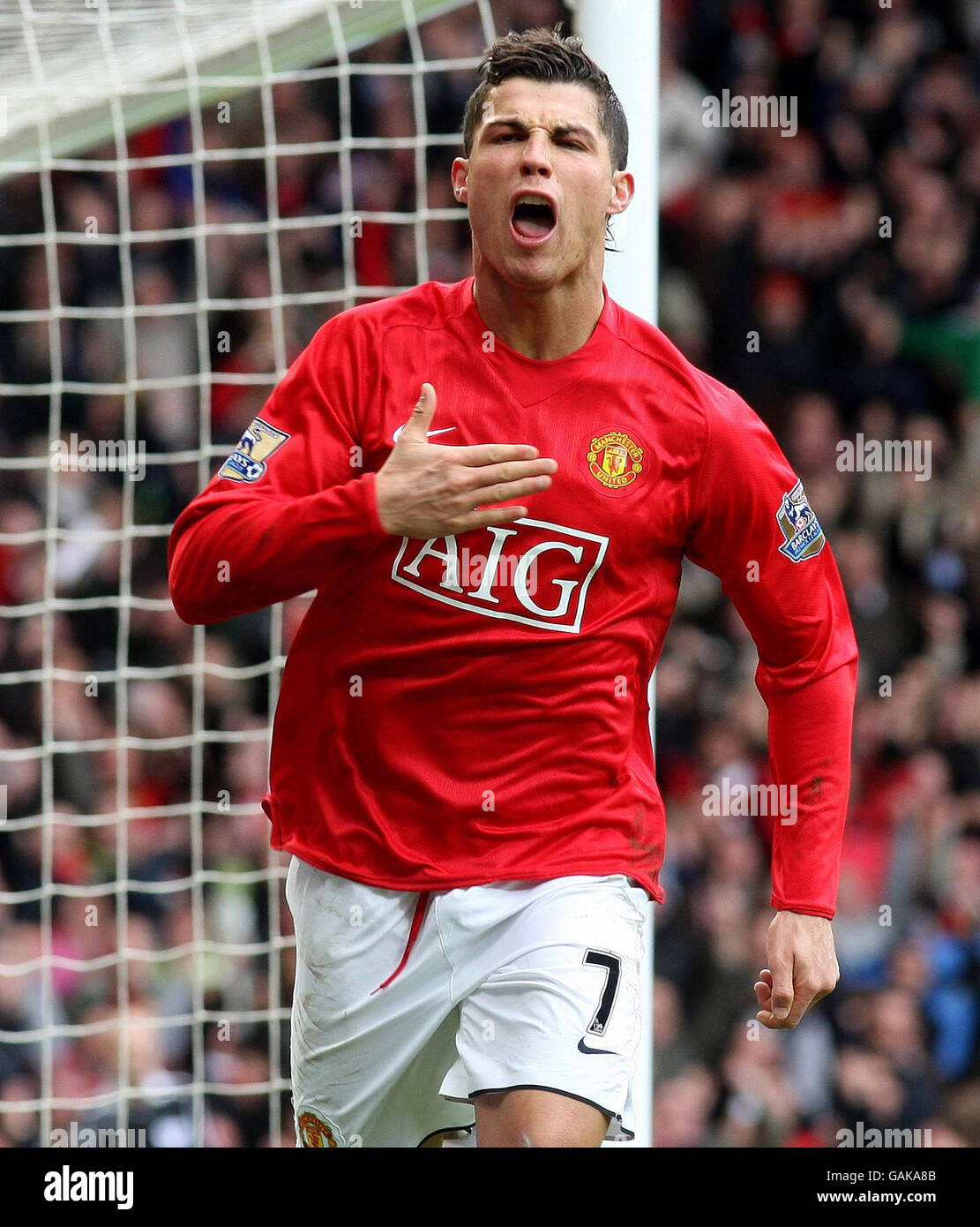 Manchester United's Cristiano Ronaldo celebrates scoring his sides second  goal of the game during the Barclays Premier League match at Old Trafford,  Manchester Stock Photo - Alamy