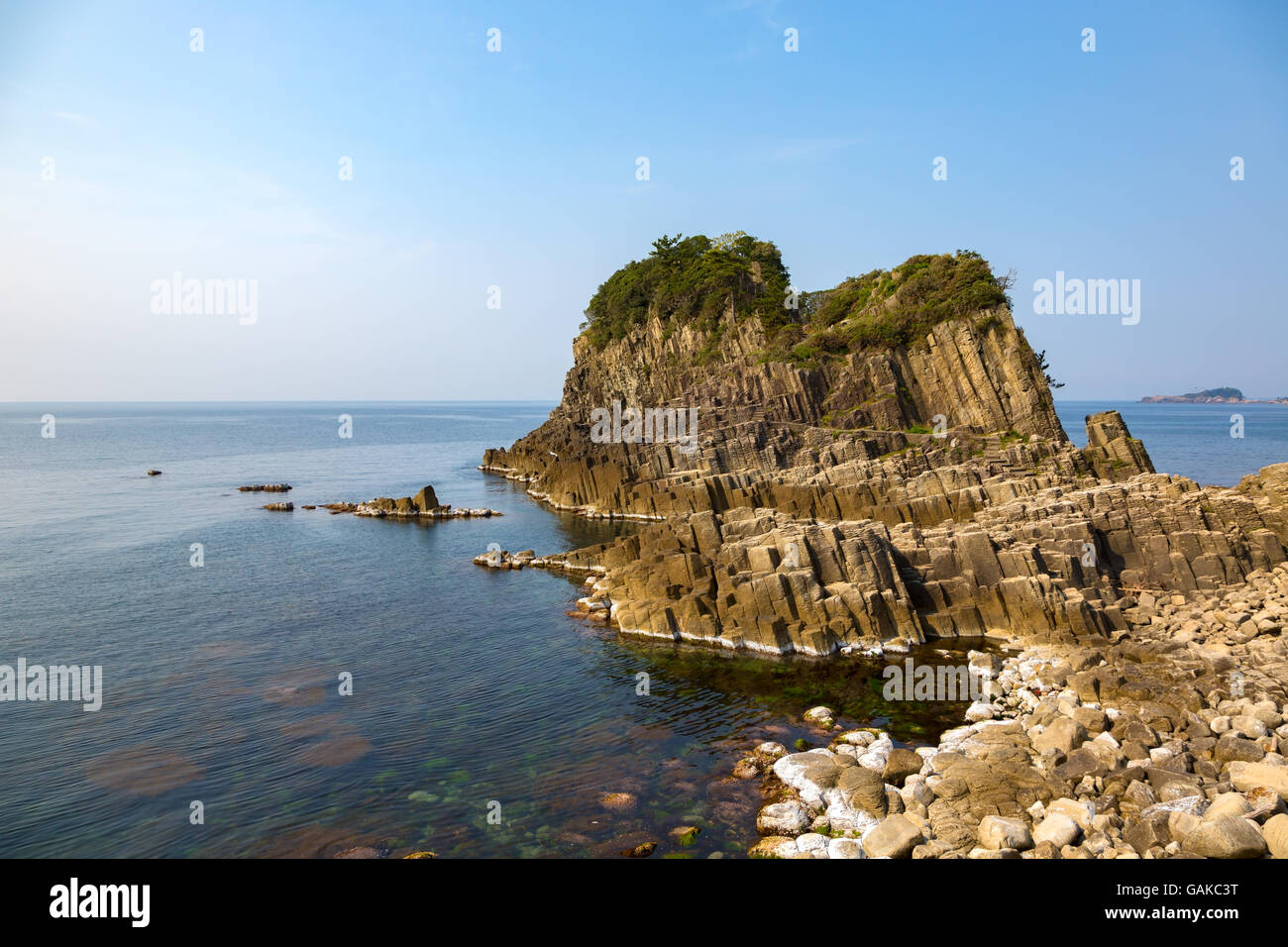 Cliff jutting far out into an ocean. Stock Photo