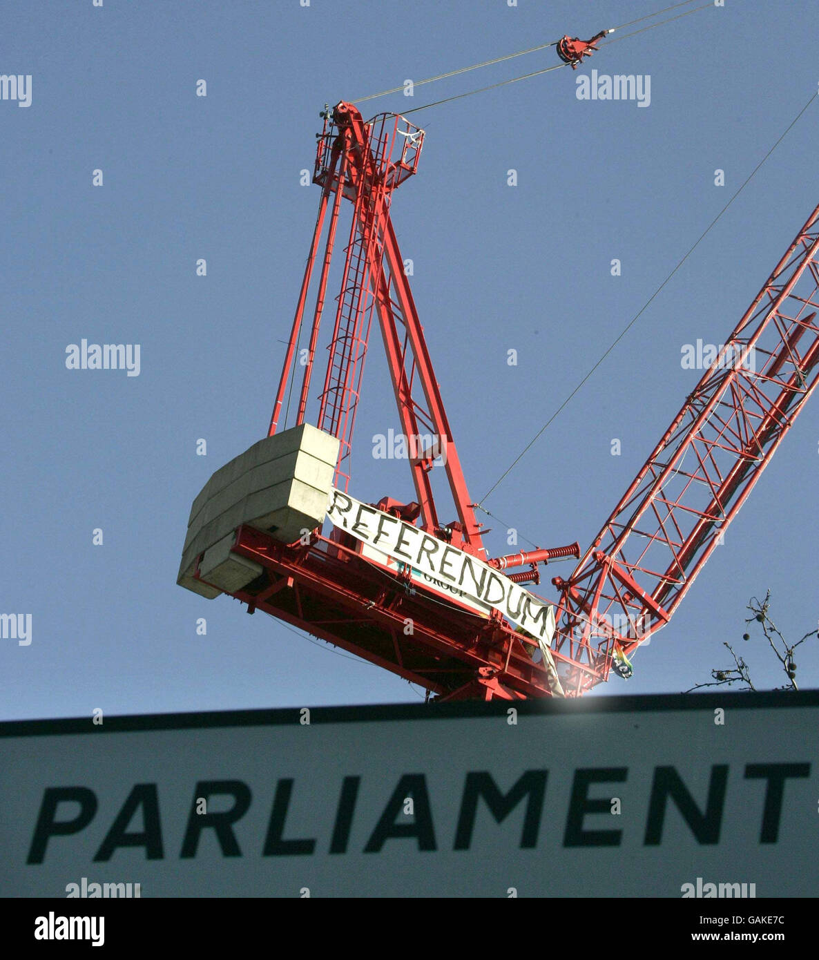 A banner unfurled by demonstrators on top of a crane in Parliament Square, London, in an apparent protest over the EU Treaty. Stock Photo