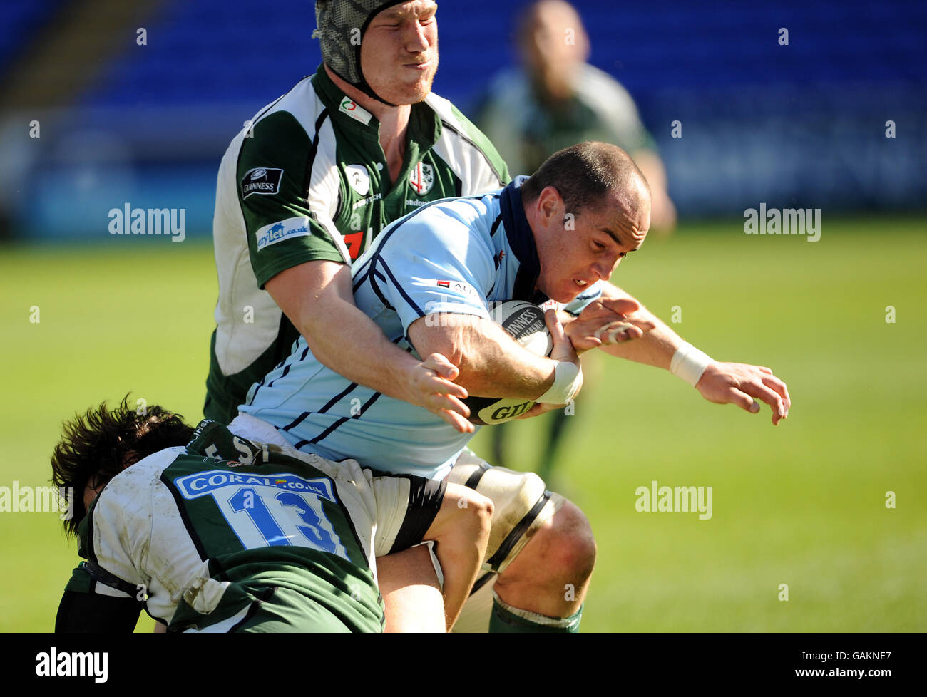 London Irish's Bob Casey and Seilala Mapasua tackle Bristol Rugby's ...