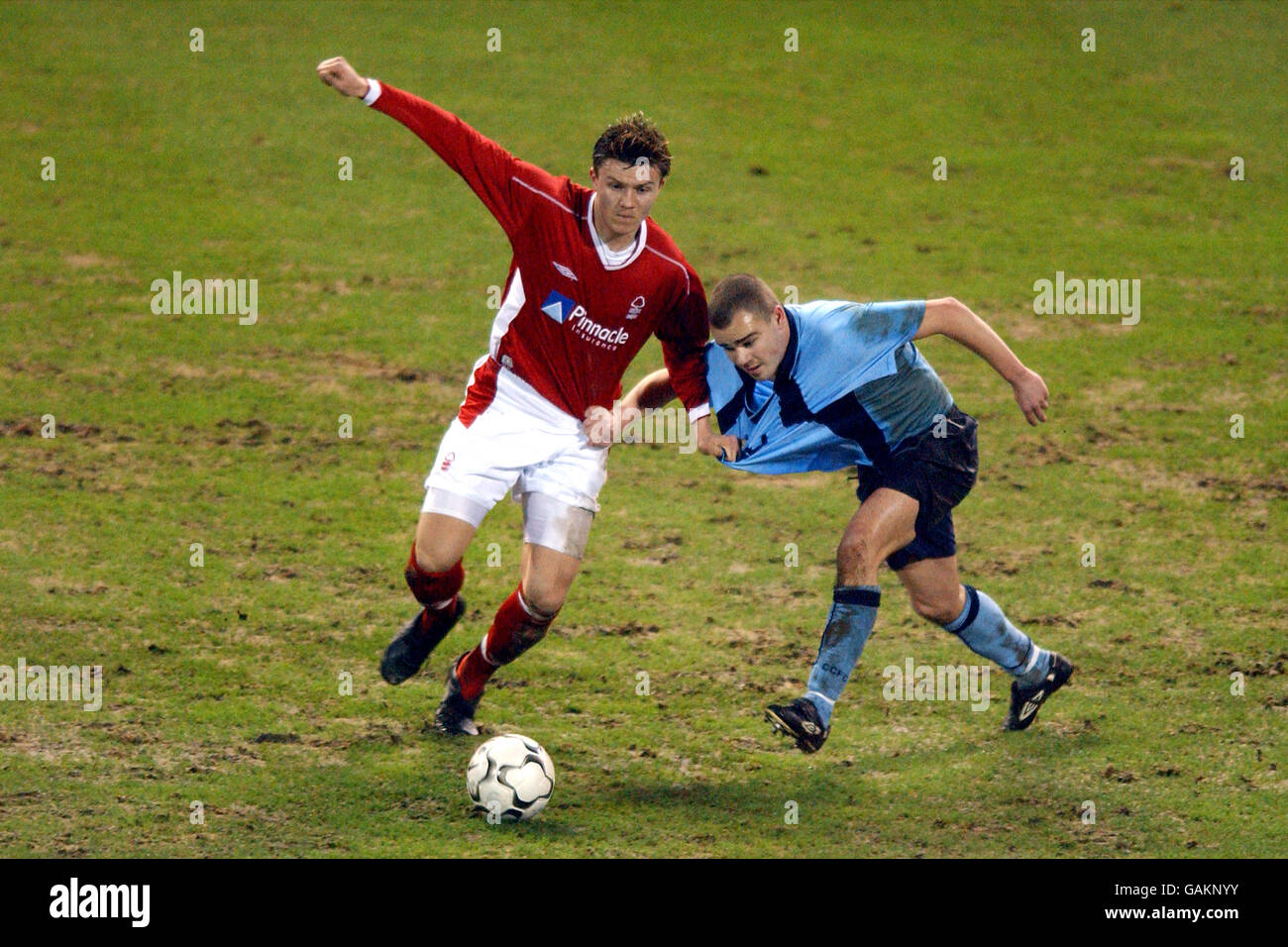 Soccer - FA Premier Reserve League - Nottingham Forest v Coventry City. Nottingham Forest's Eugen Bopp (l) holds off the challenge of Coventry City's Lee Fowler Stock Photo