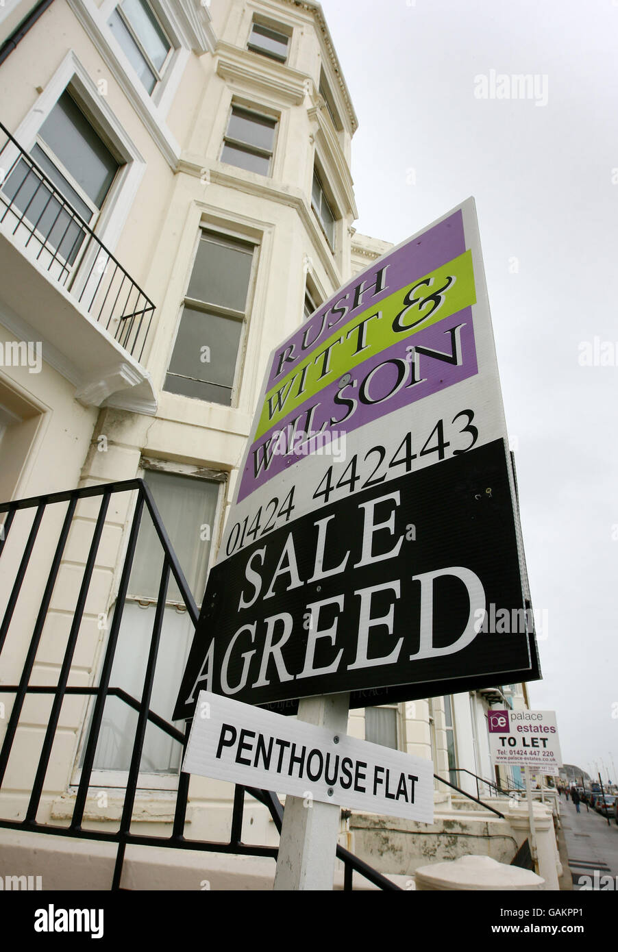 A general view of an estate agent's board on display along the seafront in Hastings, East Sussex. Stock Photo