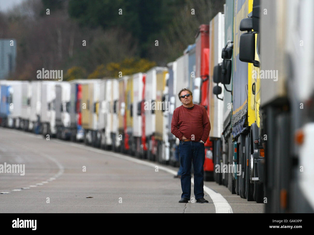 A lorry driver waits his turn to cross the Channel as Operation Stack ...