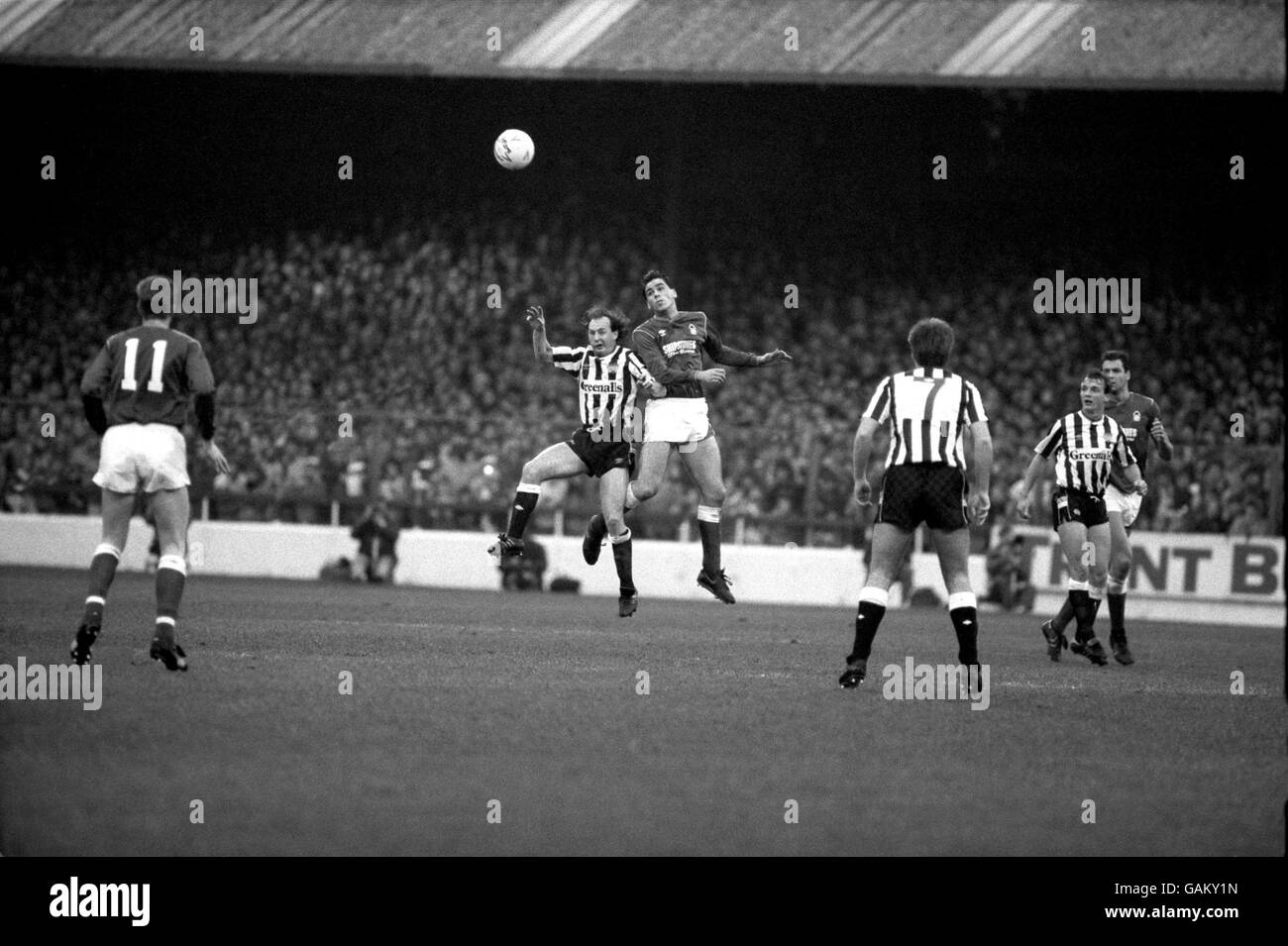 Nottingham Forest's Neil Webb (third l) beats Newcastle United's David McCreery (second l) to a header, watched by teammates Brian Rice (l) and Colin Foster (r), and Newcastle United's Neil McDonald (third r) and Paul Goddard (second r) Stock Photo