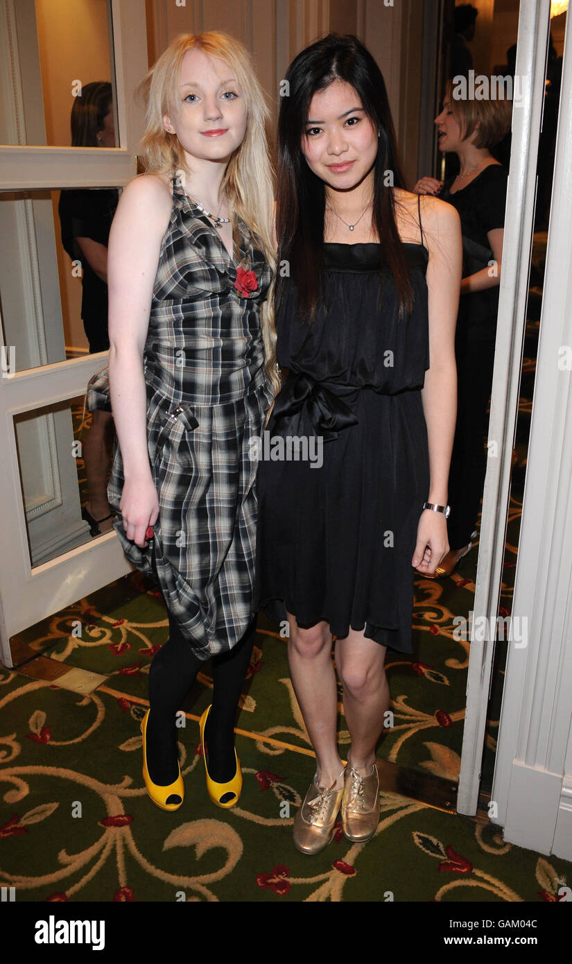 (left-right) Evanna Lynch and Katie Leung attend the pre-drinks for the Empire Film Awards at the Grosvenor House Hotel on Park Lane in central London. Stock Photo