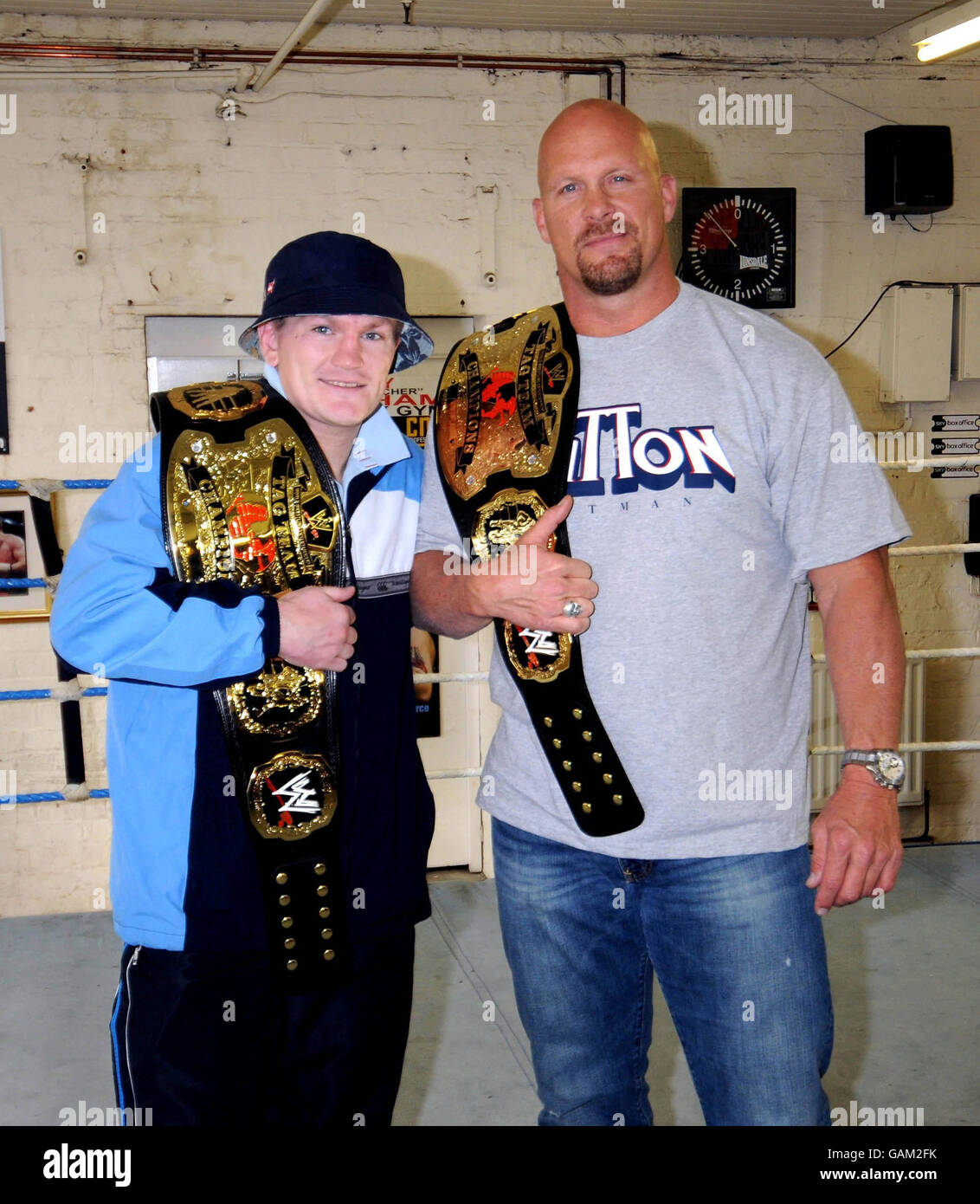WWE Superstar 'Stone Cold' Steve Austin met with Ricky 'The Hitman Hatton' (left) at Ricky's boxing gym in Denton, Manchester. Stock Photo