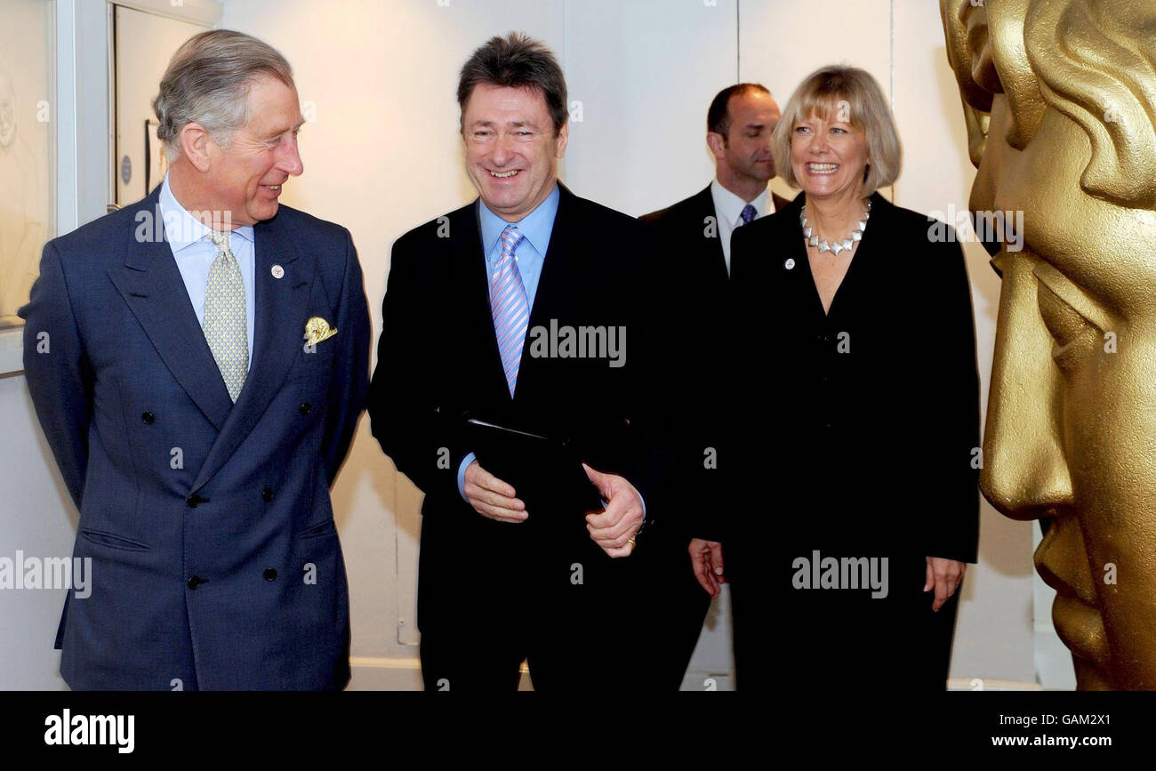 The Prince of Wales, (left), talks with Alan Titchmarsh, (centre) and Kim Lavely, Chief Executive of the Prince's Foundation for Integrated Health after he presented the foundation's annual awards in London today. Stock Photo