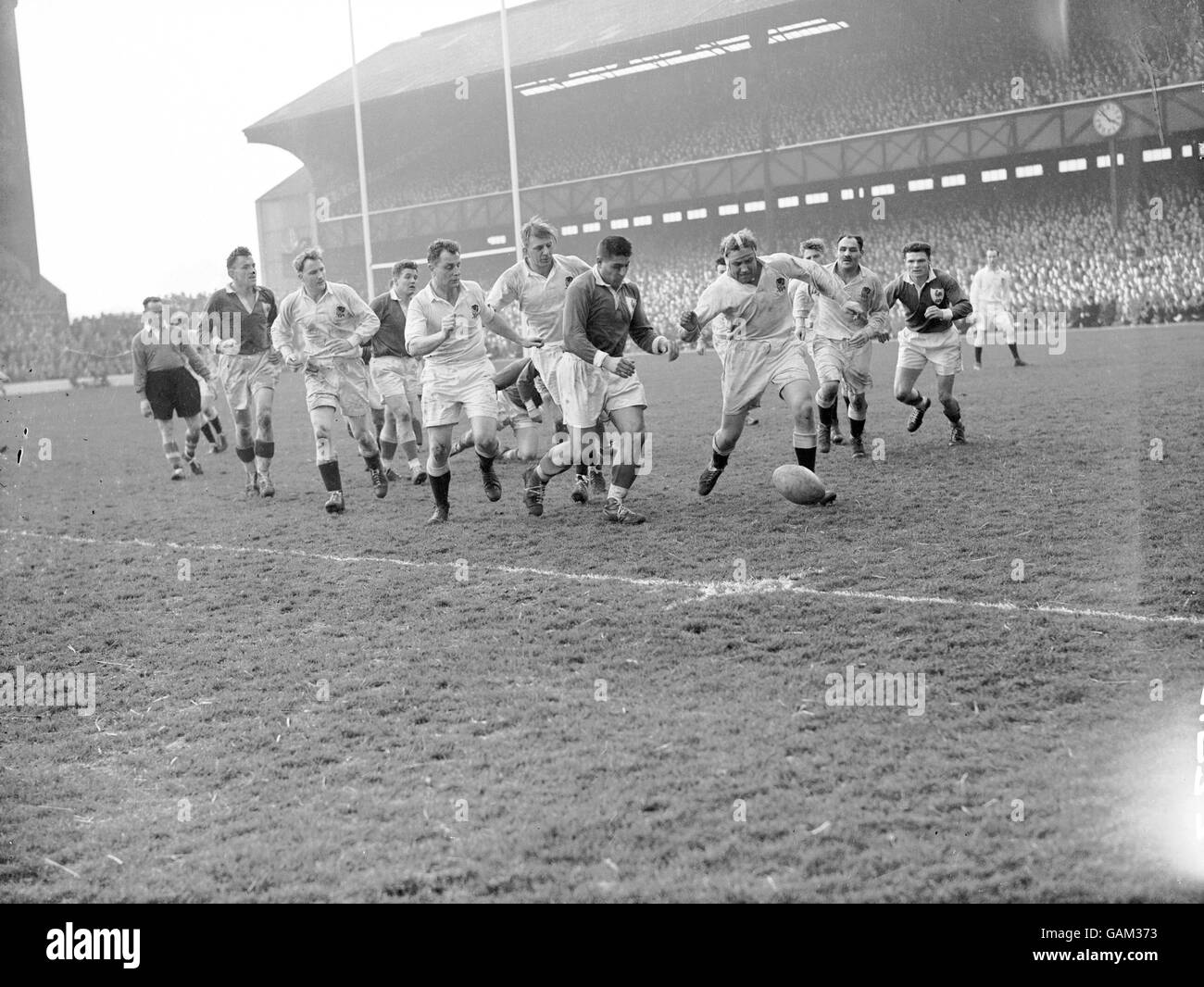 Rugby Union - Five Nations Championship - England v France. England's Squire Wilkins (r) kicks the ball on Stock Photo