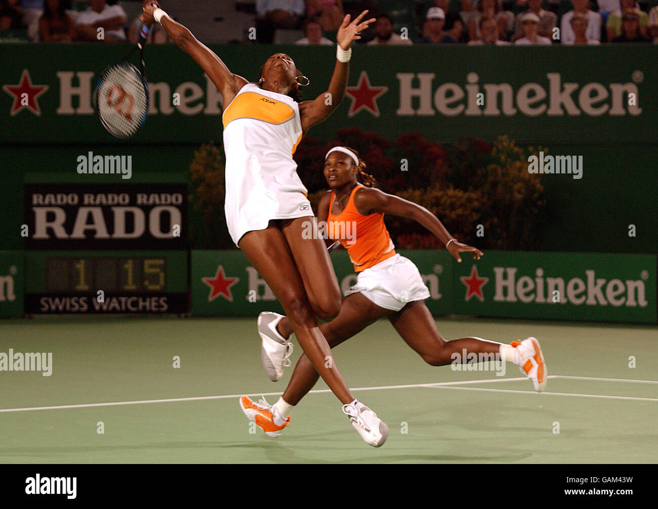 Venus Williams leaps for the ball with Serena during their Womens Doubles Final against Virginia Ruano Pascual and Paola Surarez Stock Photo