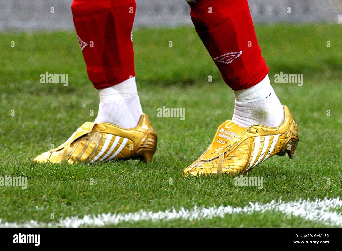 England's David Beckham wears gold boots on his 100th cap Stock Photo -  Alamy