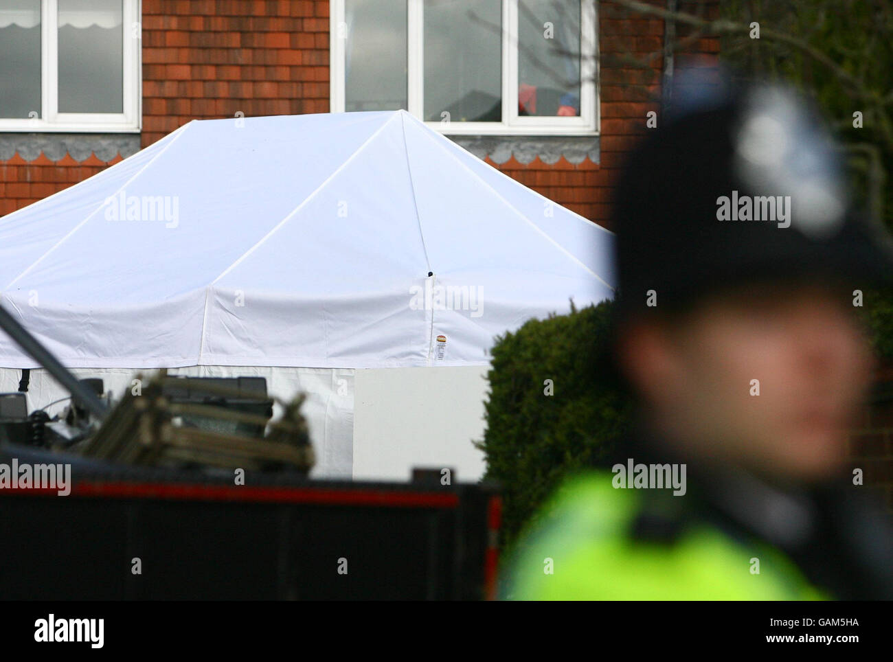 A police forensic tent at the scene in Romsey Close, Farnborough, Kent