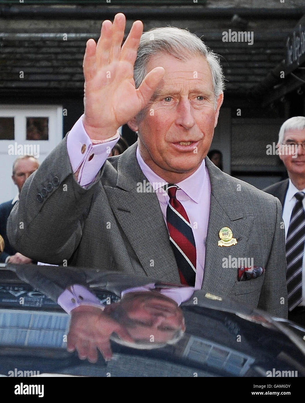 Prince Charles unveils a plaque at the village shop in Ravenstonedale ...