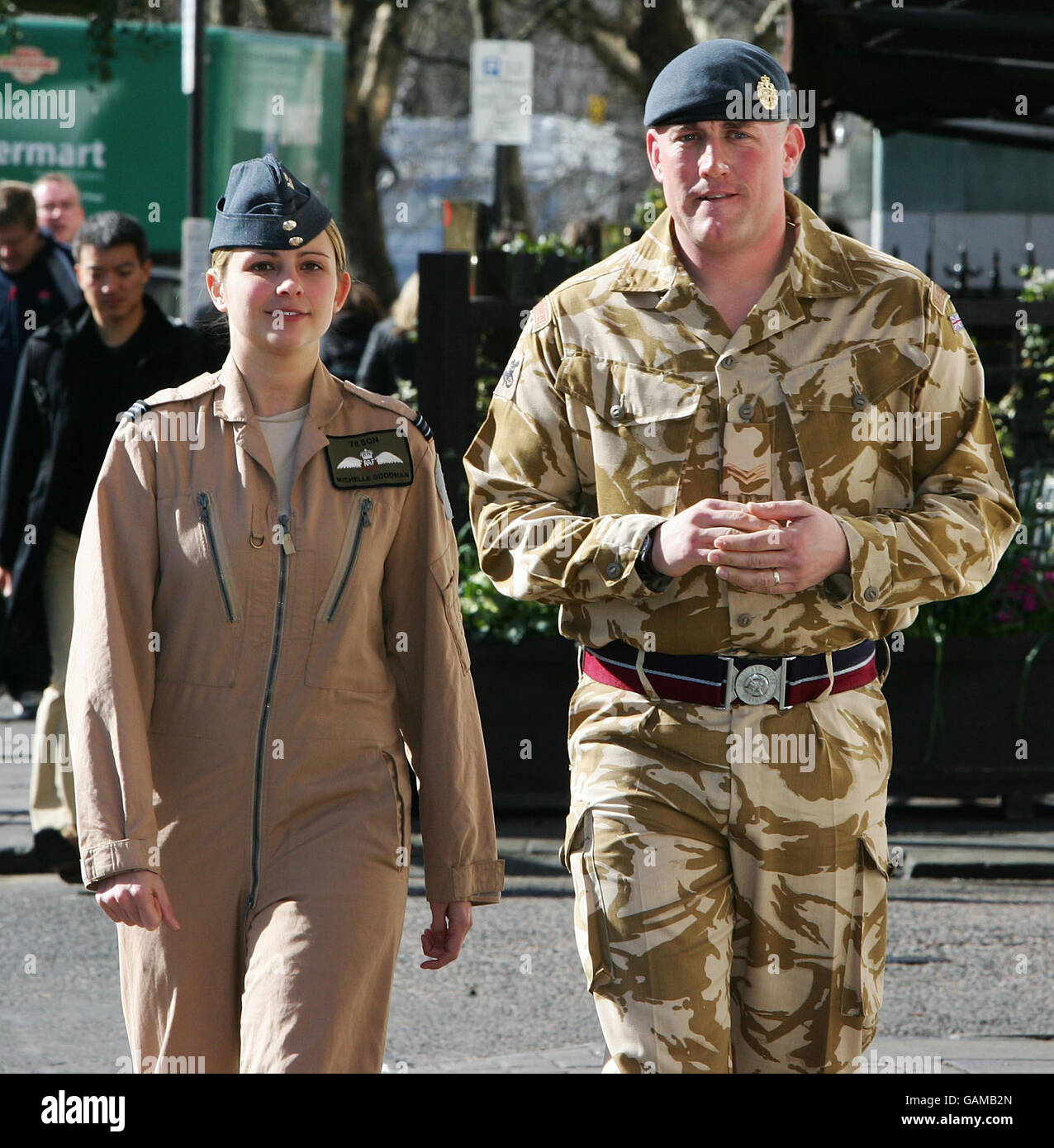 RAF Flight Lieutenant Michelle Goodman and Corporal David Hayden arrive at the RAF Club, in London, before receiving awards for bravery in Iraq. Stock Photo