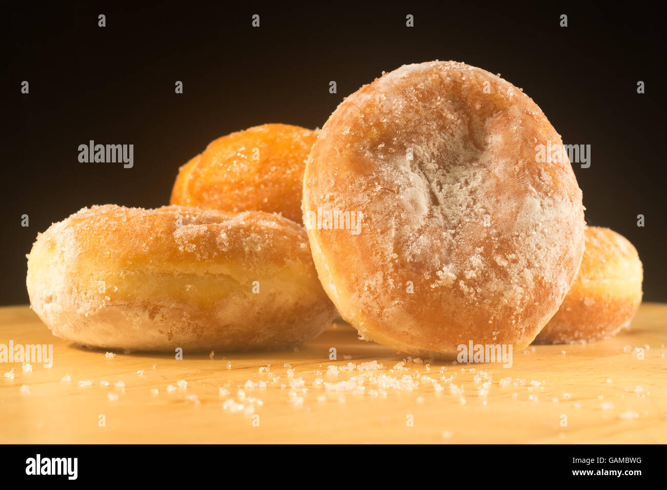 Donuts on black background Stock Photo Alamy