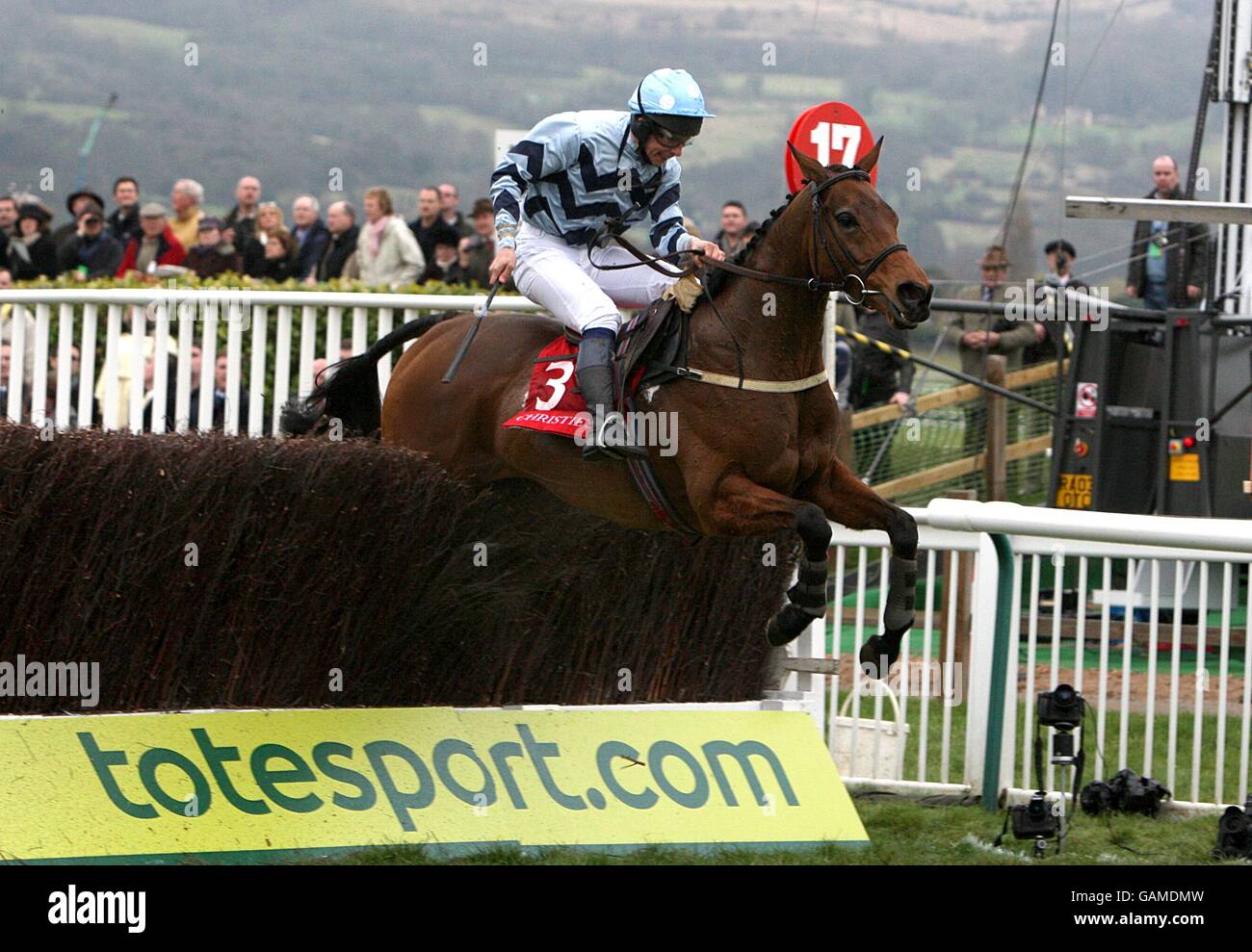 Amicelli ridden by Thomas Greenall on the way to winning in the Christie's Foxhunter Chase Challenge Cup during the Cheltenham Festival Stock Photo