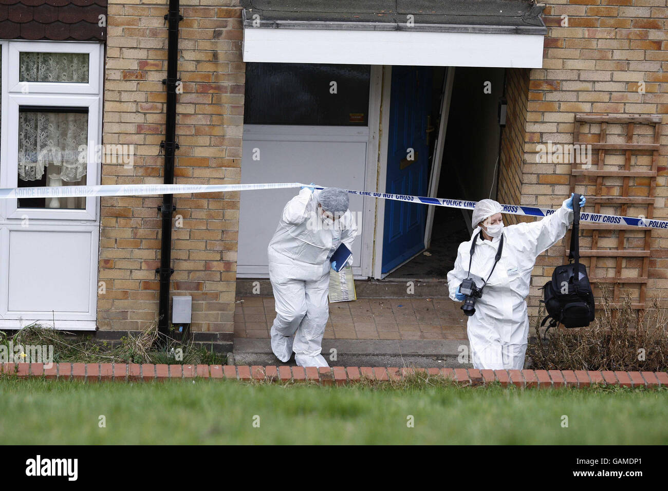 Police coutside the Lidgate Gardens address where Shannon Matthews was found today. Stock Photo