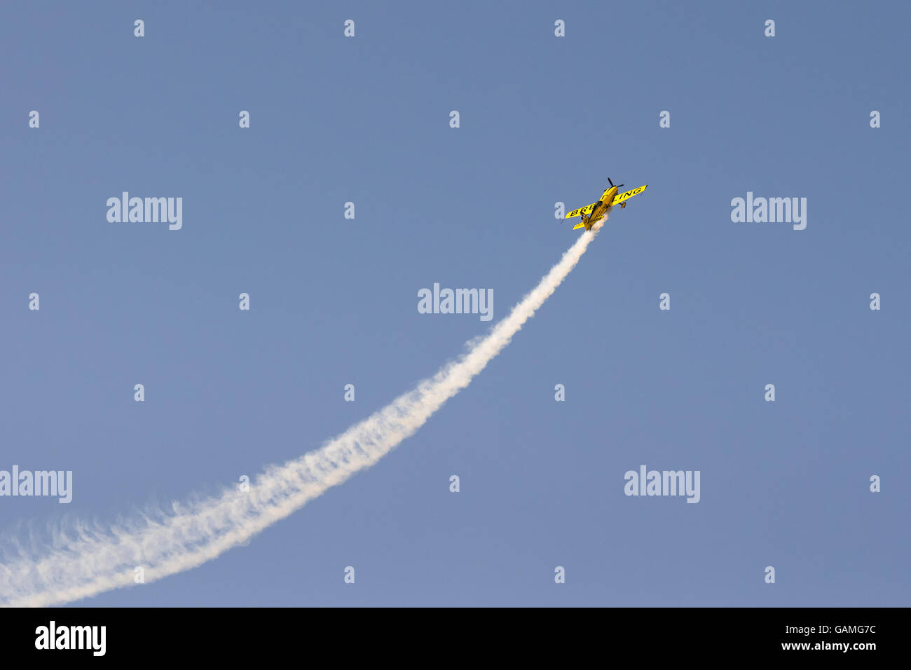 Athens, Greece 13 September 2015. Aviator plane doing tricks up in the sky at the Athens flying week air show. Stock Photo