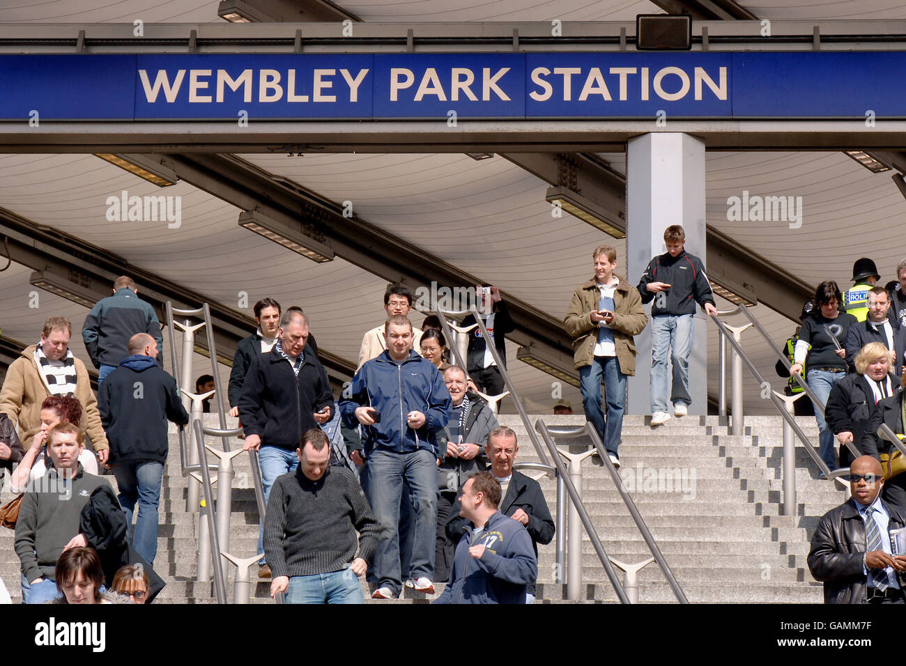 General view of Wembley Park tube station along with fans making their