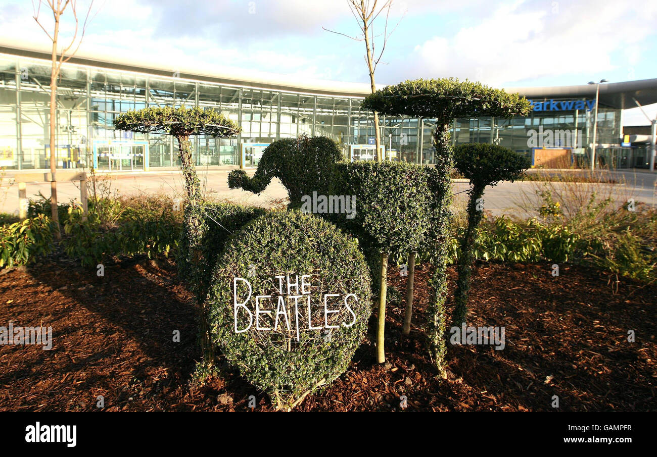 A foliage sculpture of the Beatles at Liverpool's South Parkway transport interchange, which has seen Ringo Starr's head chopped off by vandals. Stock Photo