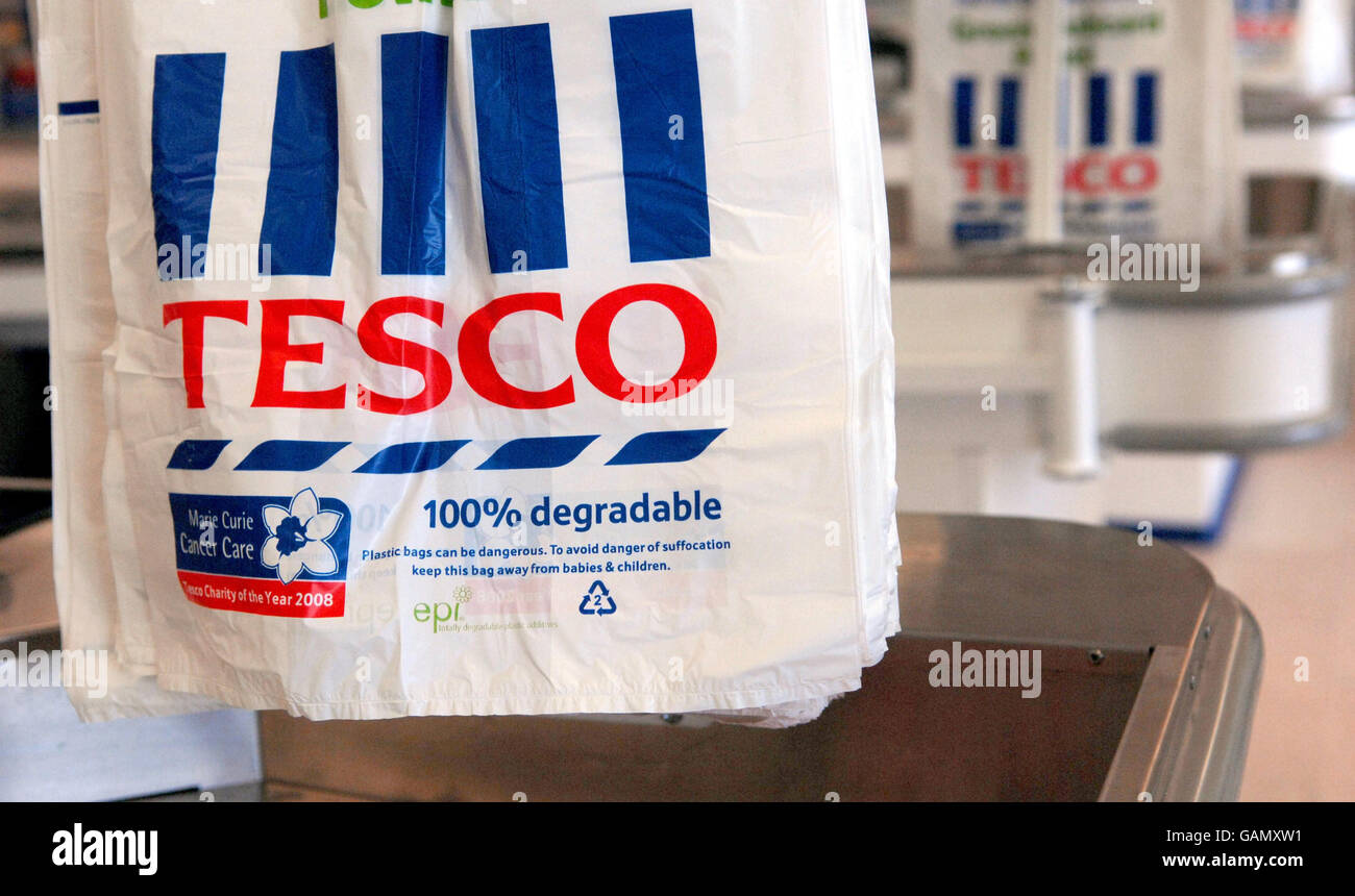 Bags inside the Tesco store on Old Kent Road, London, as the grocery chain announced an 11.8% hike in annual profits today. Stock Photo
