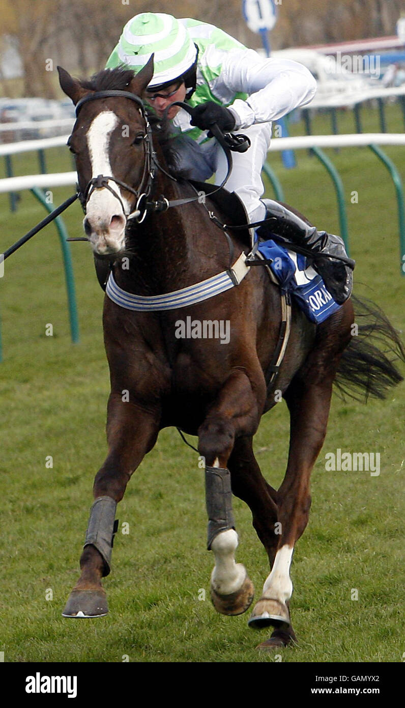 Jock Charlie Huxley ridding Iris De Balme who won the Coral Scottish Grand National Handicap Chase during the Coral Scottish Grand National Festival at Ayr Racecourse, Ayr. Stock Photo