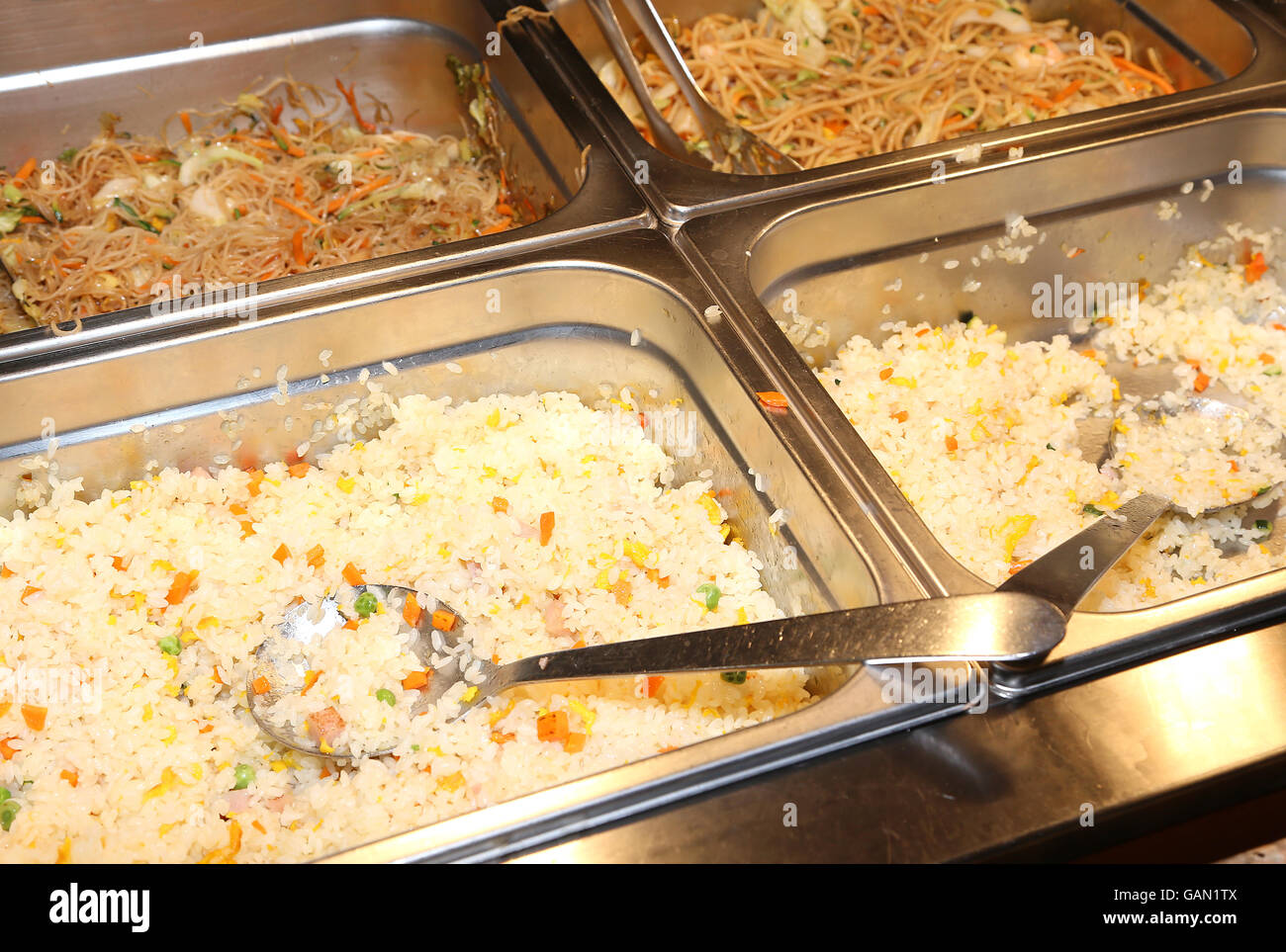 many kinds of pasta and rice in the buffet industrial cafeteria Stock Photo