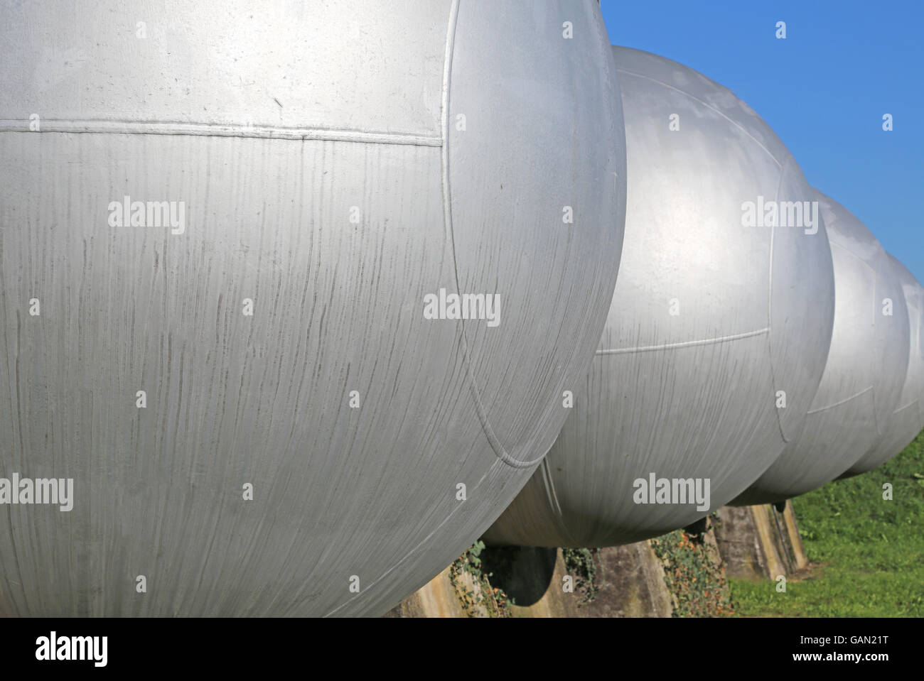 many gas tank for the storage of flammable propane gas in the fuel production refinery Stock Photo