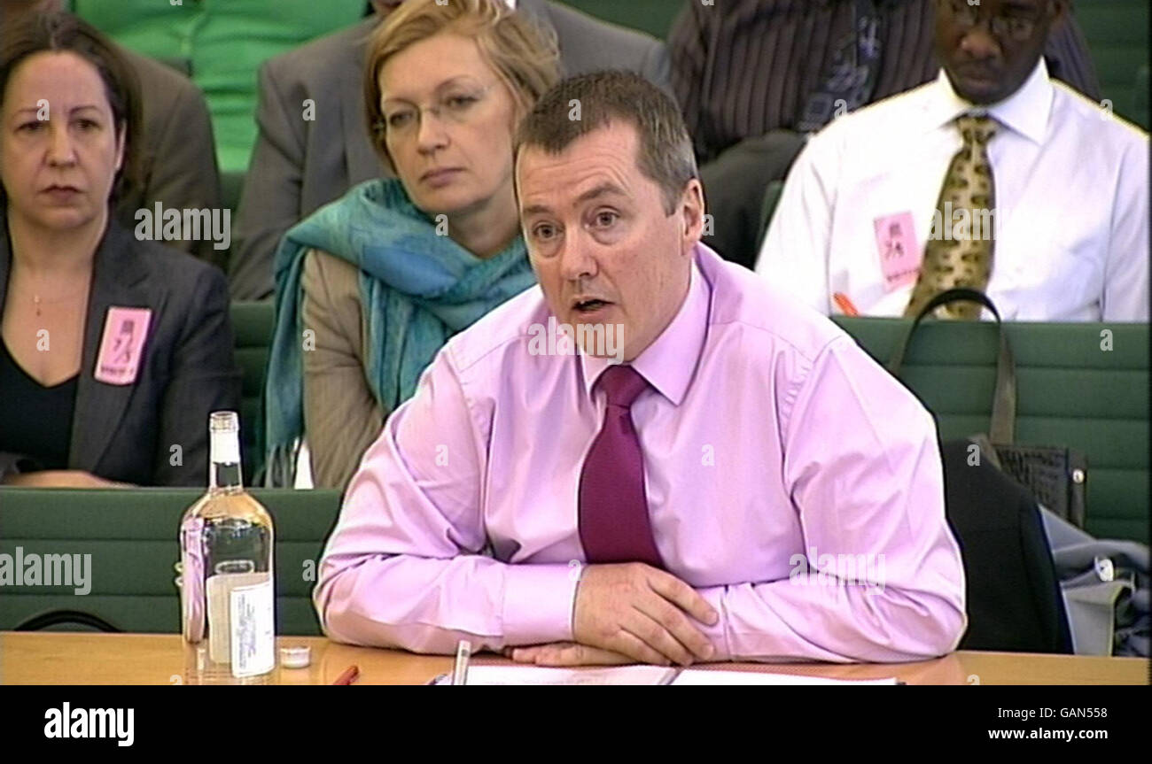 Willie Walsh, Chief Executive of British Airways, speaks to the House of Commons Transport Committee in the House of Commons, London. Stock Photo