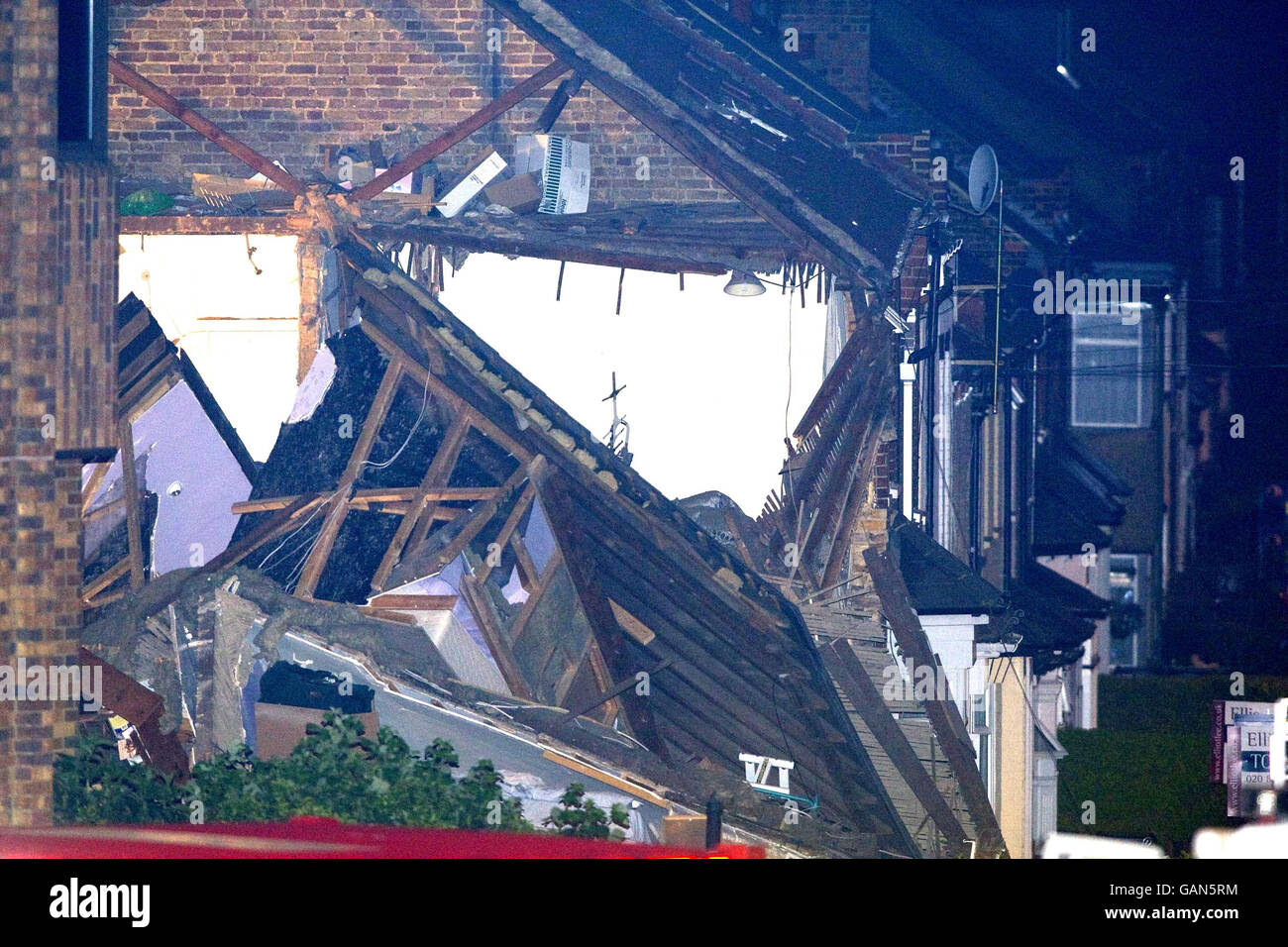 The scene at Stanley Road in South Harrow, north-west London, after an explosion caused two cottages to collapse. Stock Photo