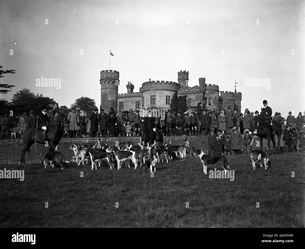 The huntsmen and their hounds gather at the home of Lord Abergarey before the hunt begins Stock Photo