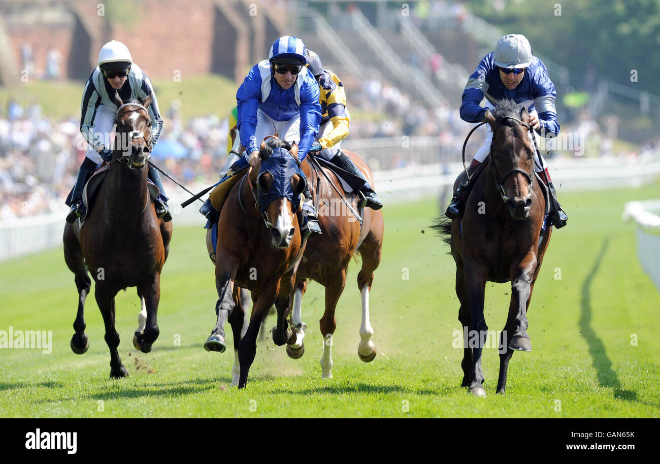 Championship Point (right) riden by Darryll Holland wins The Grant ...