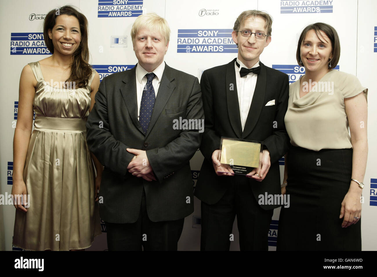 Boris Johnson, Mayor of London, in the press room with members of Capital Radio during the Sony Radio Academy Awards at the Grosvenor House Hotel in central London. Stock Photo
