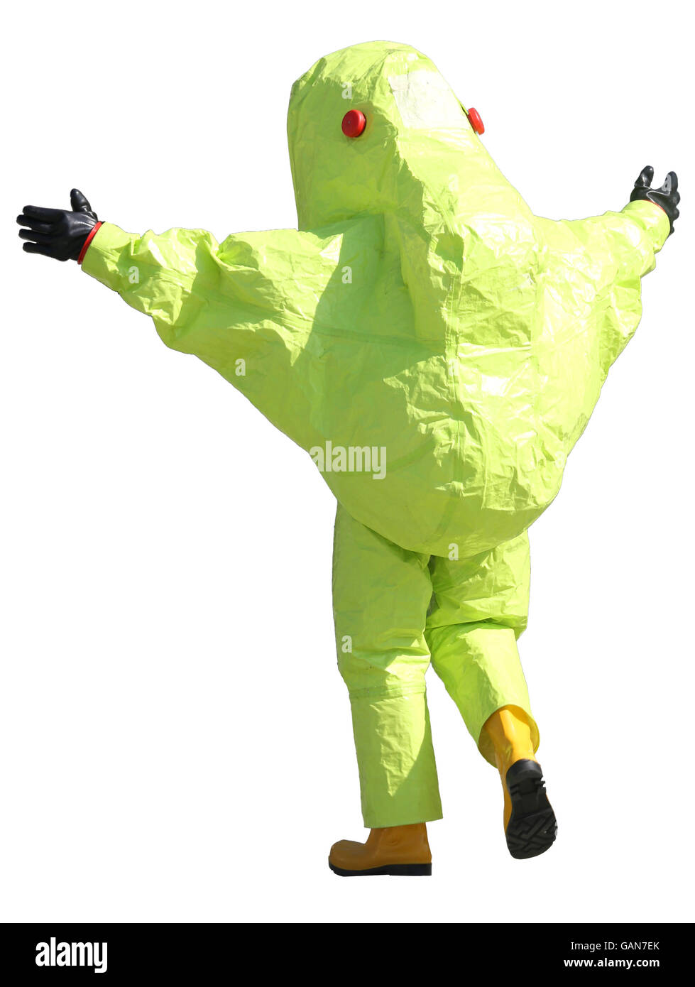 person with yellow protective suit to manage hazardous materials Stock Photo