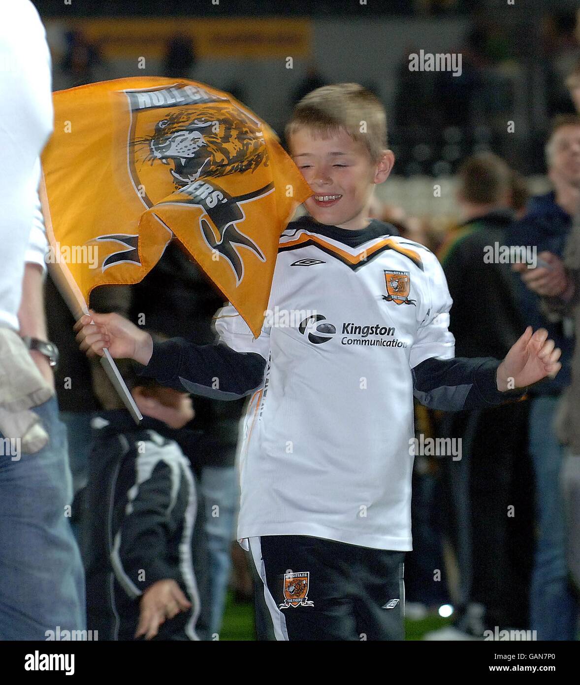 A young Hull City fan celebrates after the final whistle in the Coca